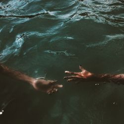 Reflection of people in water