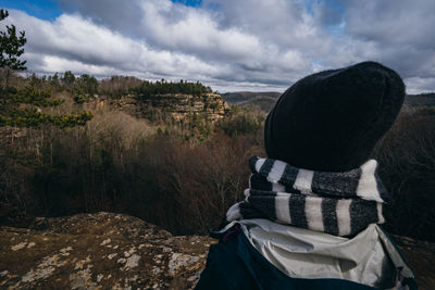 Rear view of man looking at mountains