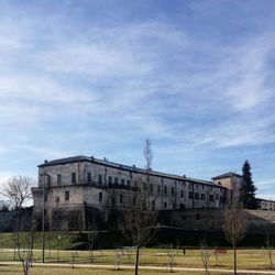 Low angle view of abandoned building against sky