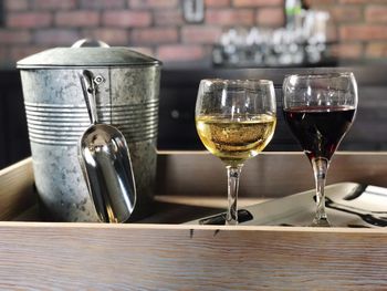 Close-up of wine in glass on table