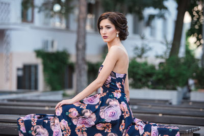 Portrait of woman standing outdoors