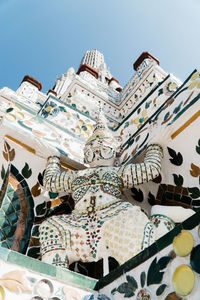 Low angle view of statue against sky