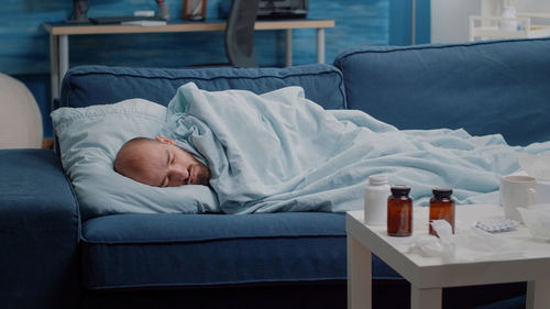 Man sleeping on bed