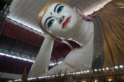 Low angle view of illuminated statue at amusement park