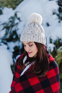 Young woman in snow during winter