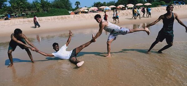 People enjoying at beach