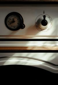 Close-up of clock on wall