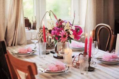 Flower vase on table