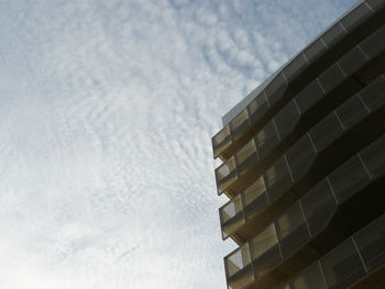 Low angle view of modern building against sky