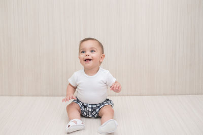 Portrait of a smiling girl sitting