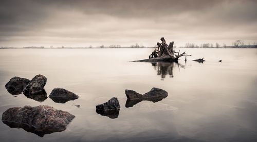 Scenic view of lake against sky