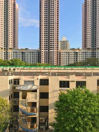 Low angle view of skyscrapers against sky