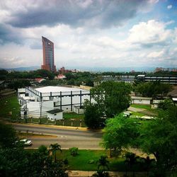 View of city against cloudy sky