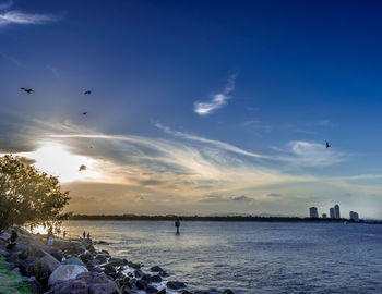 Scenic view of sea against sky during sunset