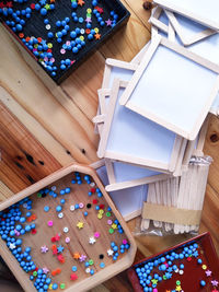 High angle view of multi colored umbrellas on table