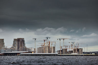 Buildings in city against sky