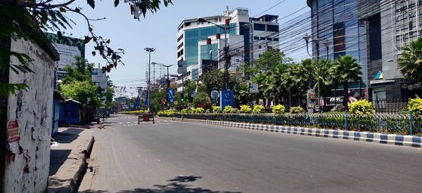Street amidst buildings against sky
