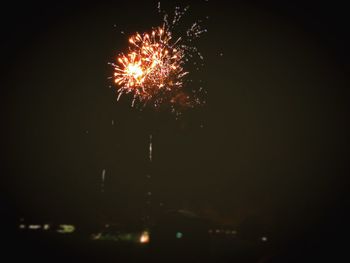 Low angle view of firework display