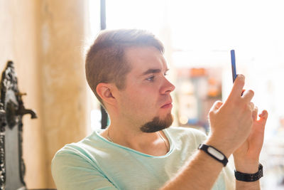 Man photographing outdoors