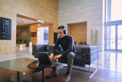 Man working on table in office