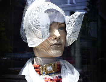 Portrait of man wearing mask at store