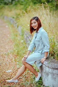 Portrait of smiling young woman outdoors