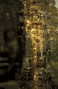 Close-up of old statues in temple