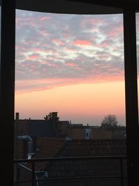 Silhouette of built structures at sunset