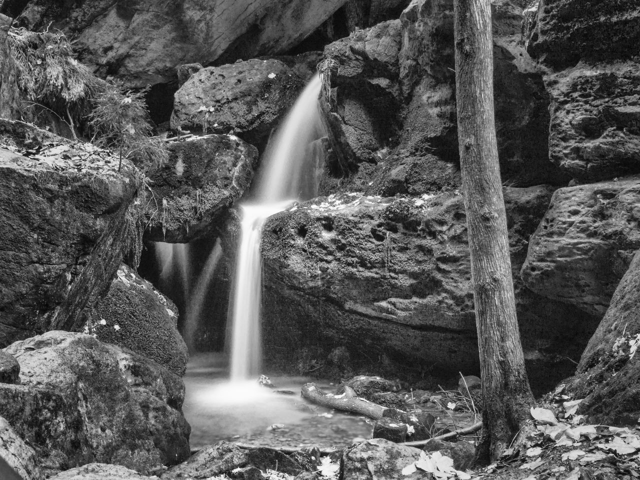 SCENIC VIEW OF WATERFALL