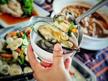 Close-up of hand holding food