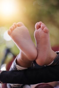 Low section of baby feet