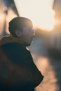 Portrait of child yawning