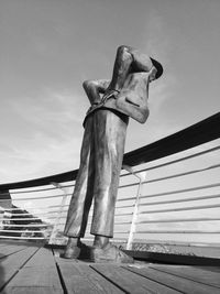 Low angle view of statue against sky