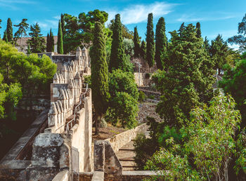 Trees on fort against sky at gibralfaro