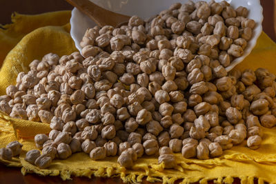 High angle view of chick-peas in bowl on table