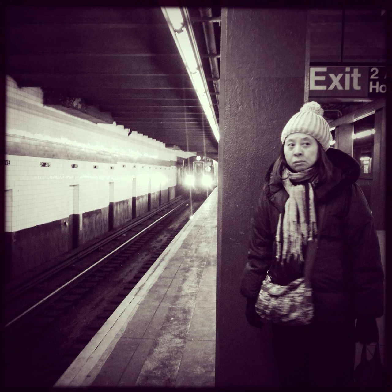 indoors, railroad station, railroad station platform, rail transportation, public transportation, transfer print, railroad track, illuminated, subway station, transportation, subway, men, auto post production filter, train - vehicle, text, lifestyles, ceiling, communication