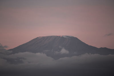 Scenic view of mountains against sky during sunset