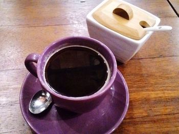 High angle view of coffee cup on table