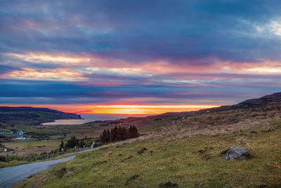 Scenic view of landscape against sky during sunset