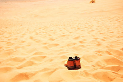 Photo of a pair of shoes in the desert