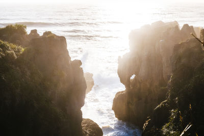 High angle view of rock formation by sea