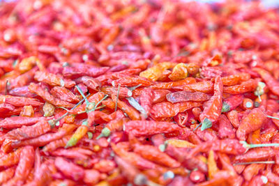 Full frame shot of red chili peppers for sale in market