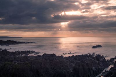 Scenic view of sea against sky during sunset