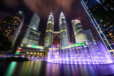 Night watershow in front of petronas twin tower, kl, malaysia