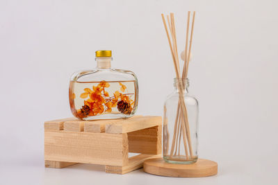 Close-up of bottles against white background