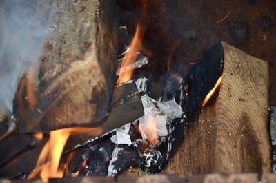 Close-up of fire on wood