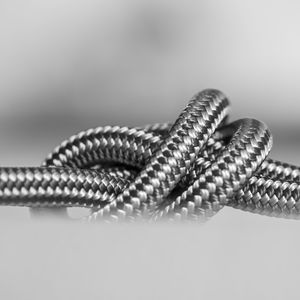 Close-up of rope against white background