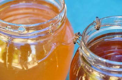 Close-up of honey in jars on table