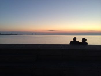 Scenic view of sea at sunset