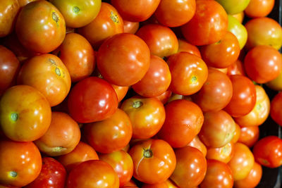 Full frame shot of oranges at market